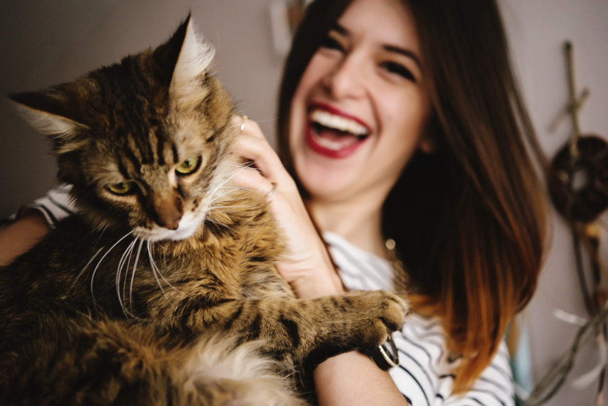 woman and cat